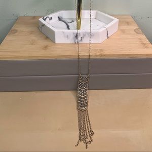 Drapey gold colored necklace